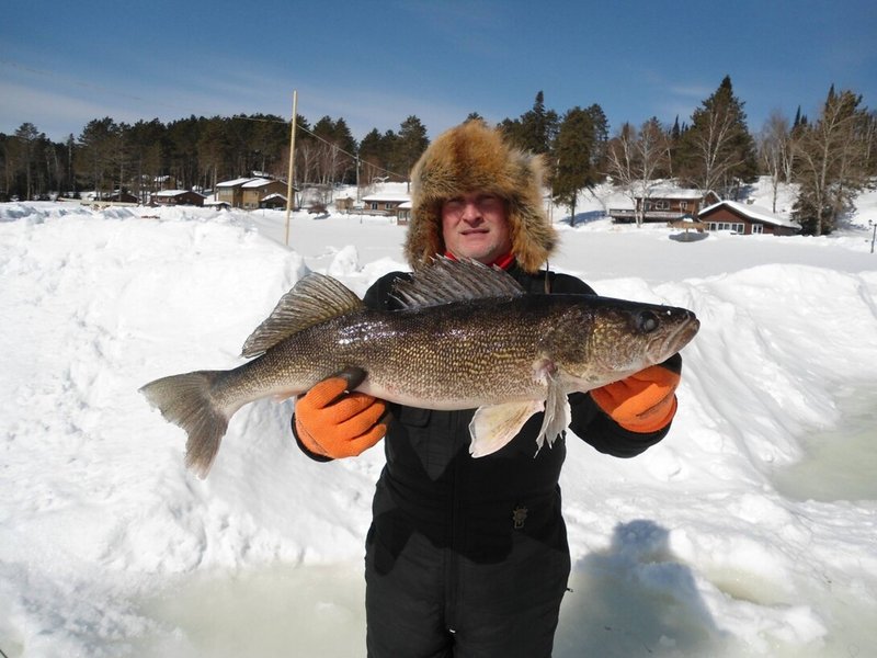 Ice fishing gamble game - Experience the Thrill of Ice Fishing in the Frozen Waterways of Canada